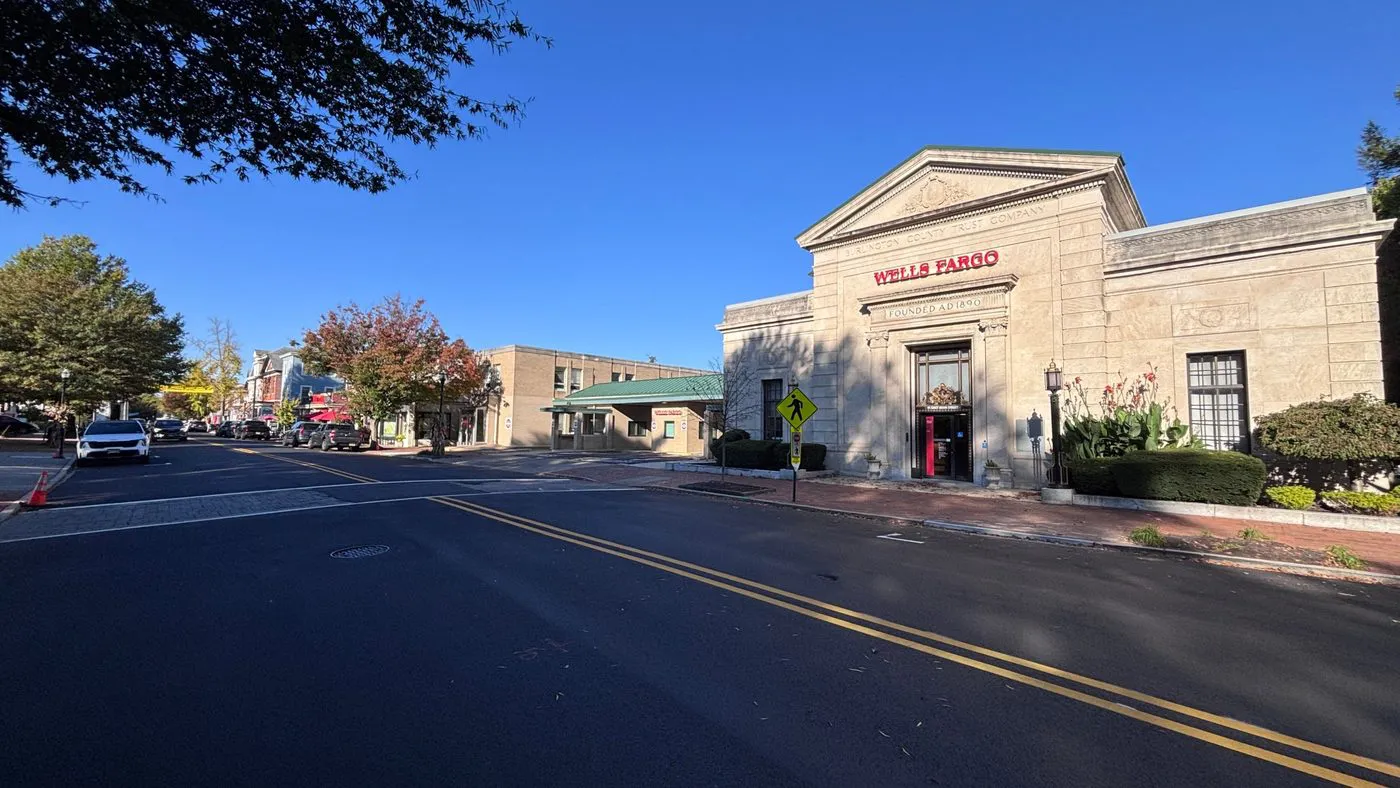 Historic stone bank building on East Main Street in Moorestown, inscribed Burlington County Trust Company, founded 1890
