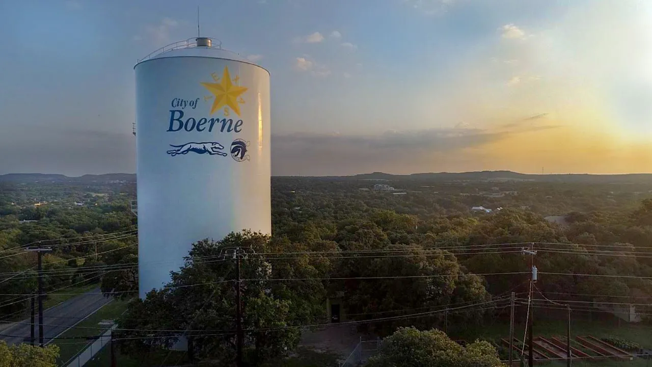 City of Boerne water tower at sunset above the Texas Hill Country