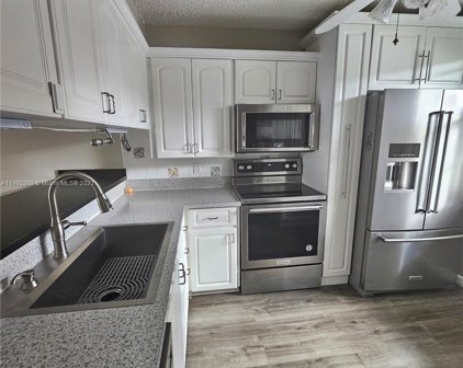 1504 Whitehall Dr Unit #105, Davie