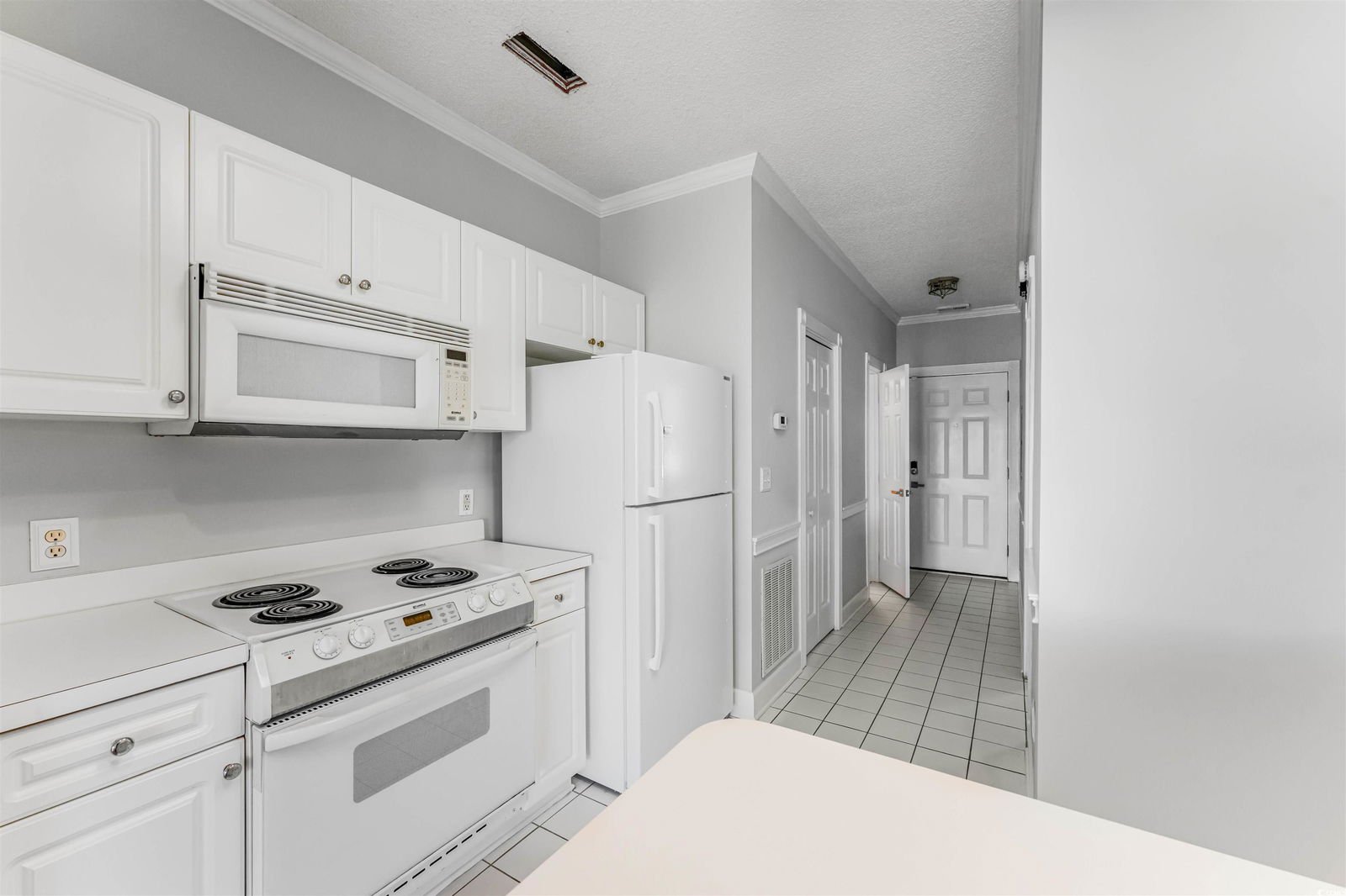 MLS 2424122 The Gardens at Cypress Bay 4179 Hibiscus Dr. Unit 202