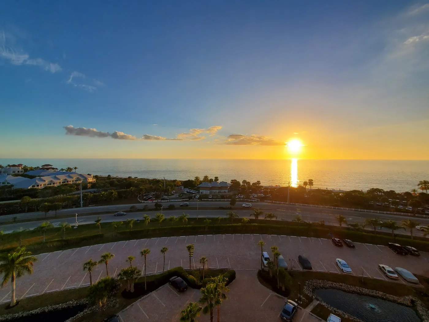 Gulf sunset view from a Bonita Springs luxury high rise condo with sweeping oceanfront panorama