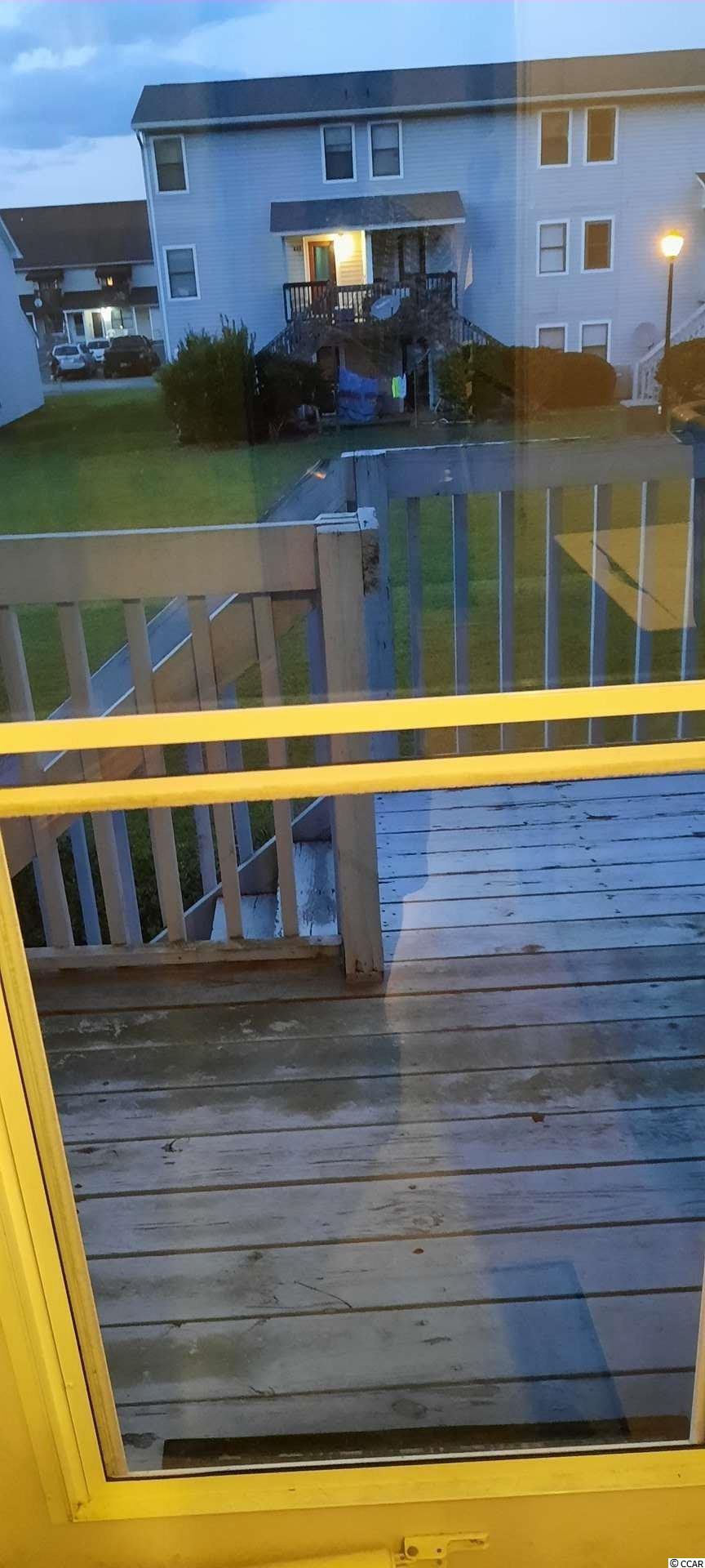 MLS 2119511 Courtyard at Yardarm 801 Burcale Rd. Unit H2, Myrtle