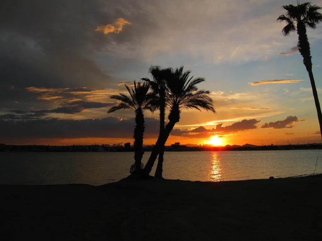 Orange and pink sunset over Lake Havasu City and the Arizona desert