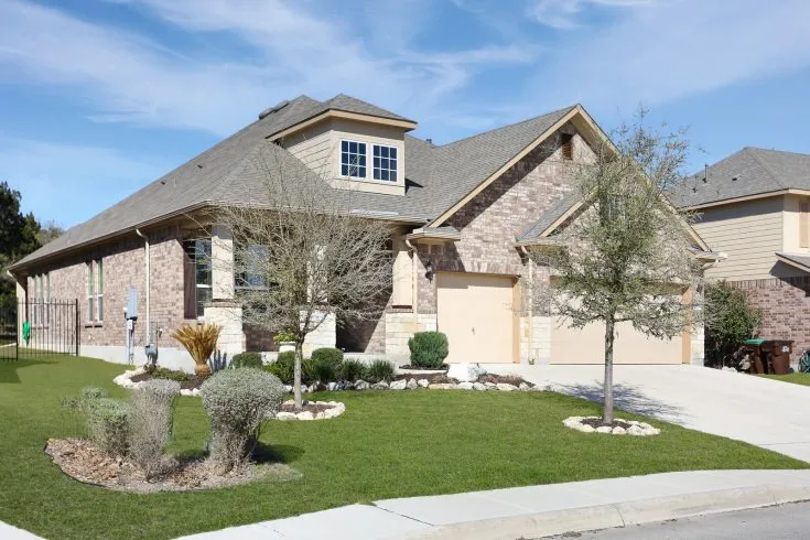 Property video thumbnail, brick and stone home