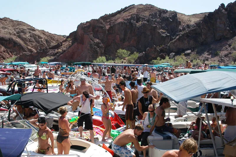 Boats gathered at Copper Canyon on Lake Havasu during warm-weather recreation