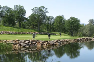 Gold Hills golf course hole #15, a golf course community surrounded by custom homes