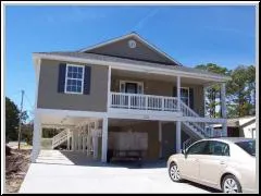 Raised beach Houses for sale