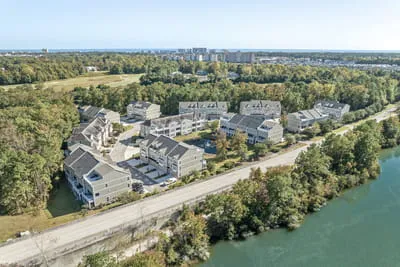 The Dye Townhomes from the Air, with the Small Pond | Barefoot Resort
