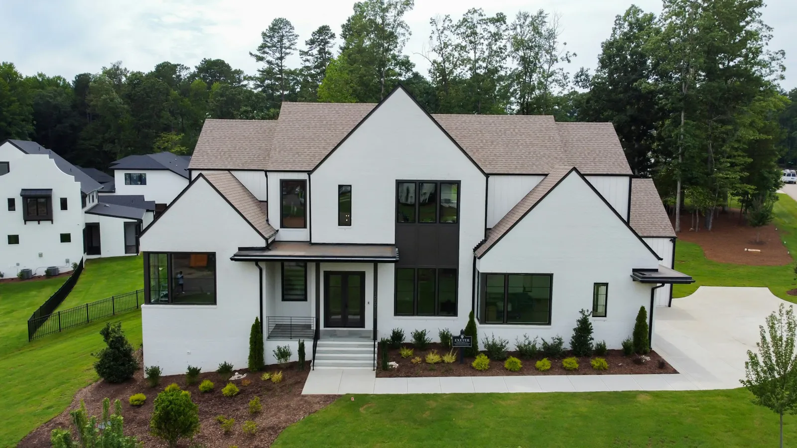 White farmhouse-style home for sale in the Houston area