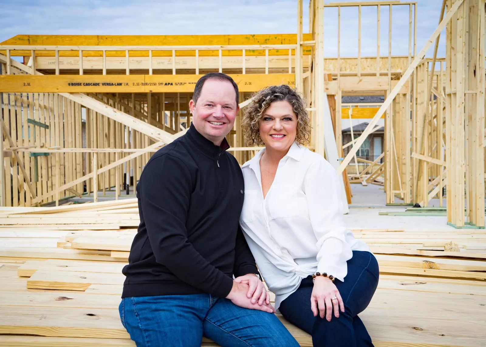 Charley and Alisa Wasson at a new home construction site